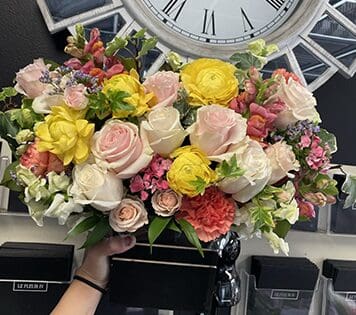 Flower arrangment made in Westminster, CA, Orange County, by Bolsa Florist, product is called Walking On Sunshine - Wood Pot