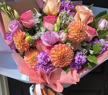 Flower arrangment made in Westminster, CA, Orange County, by Bolsa Florist, product is called Ray of Sun - Wrapped Bouquet